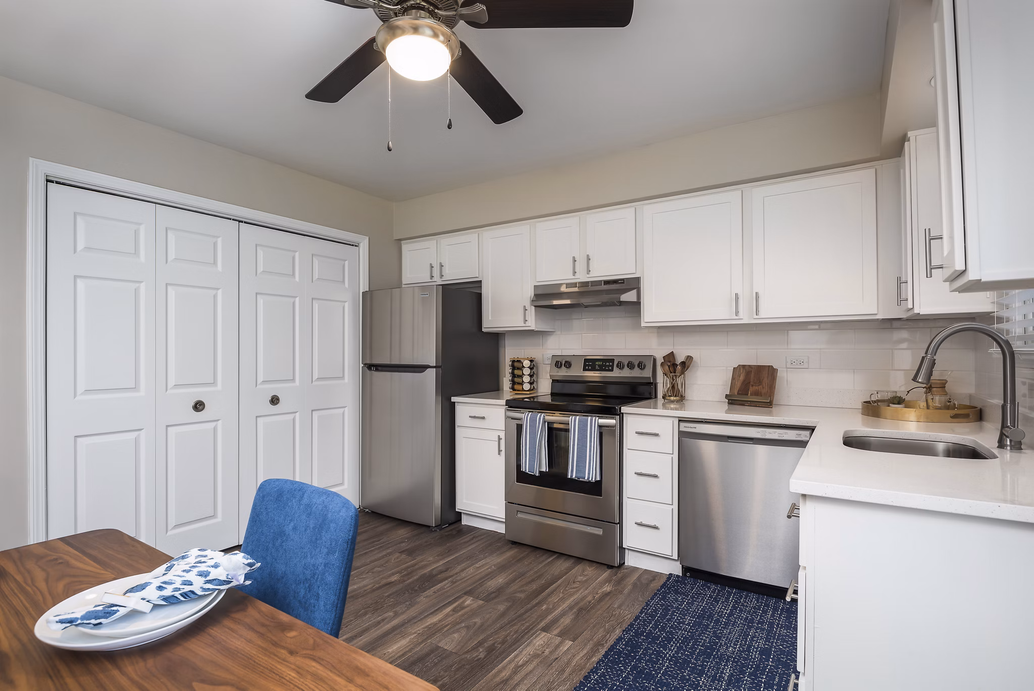 Open dining area featuring modern decor and ample natural light at Haven on Long Grove Apartments