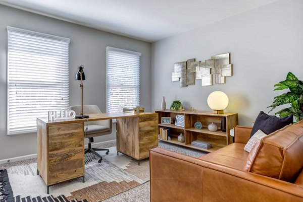 Minimalist home office with modern furnishings at Haven on Long Grove Apartments