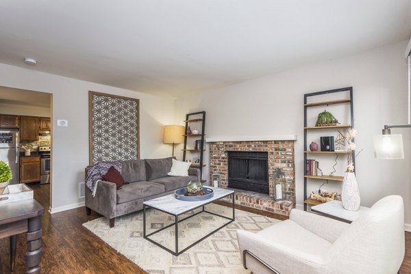 Spacious living room with modern decor and large windows at Haven on Long Grove Apartments