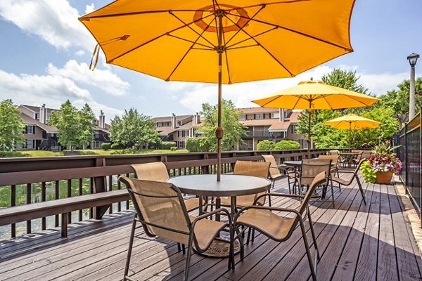 Cozy outdoor patio with modern furniture at Haven on Long Grove Apartments