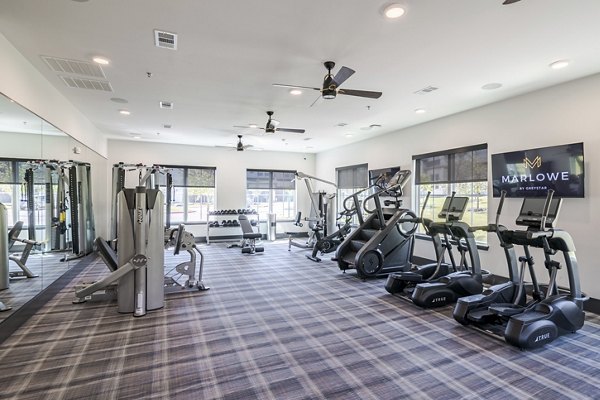 fitness center at Marlowe Denton Apartments 