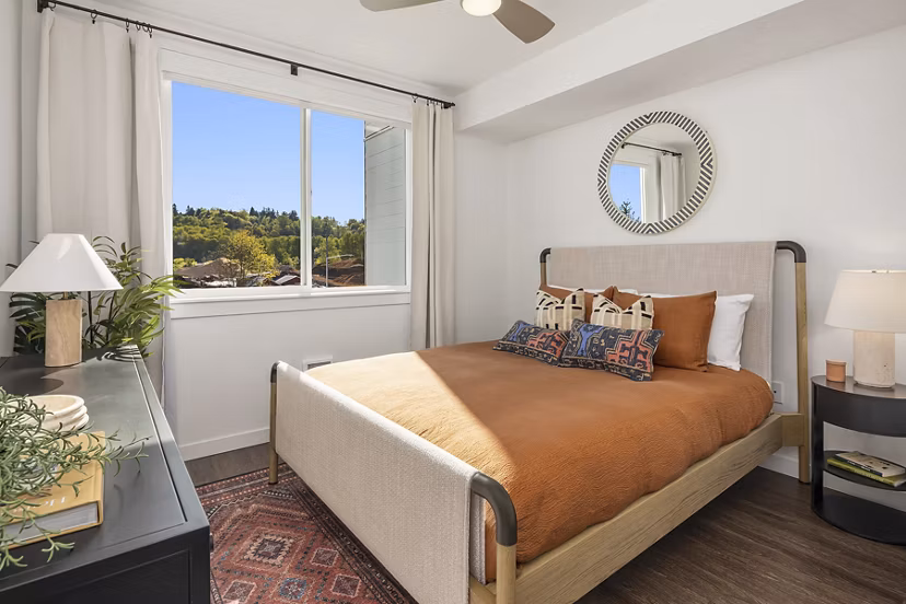 Modern bedroom with stylish furnishings at Prose Kent Station Apartments