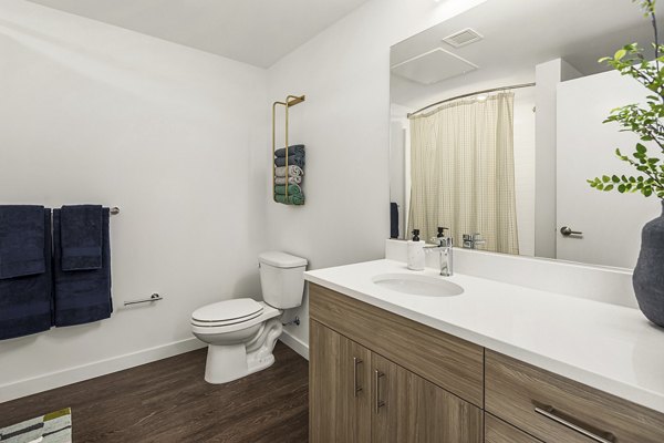 Bathroom featuring modern fixtures at Prose Kent Station Apartments