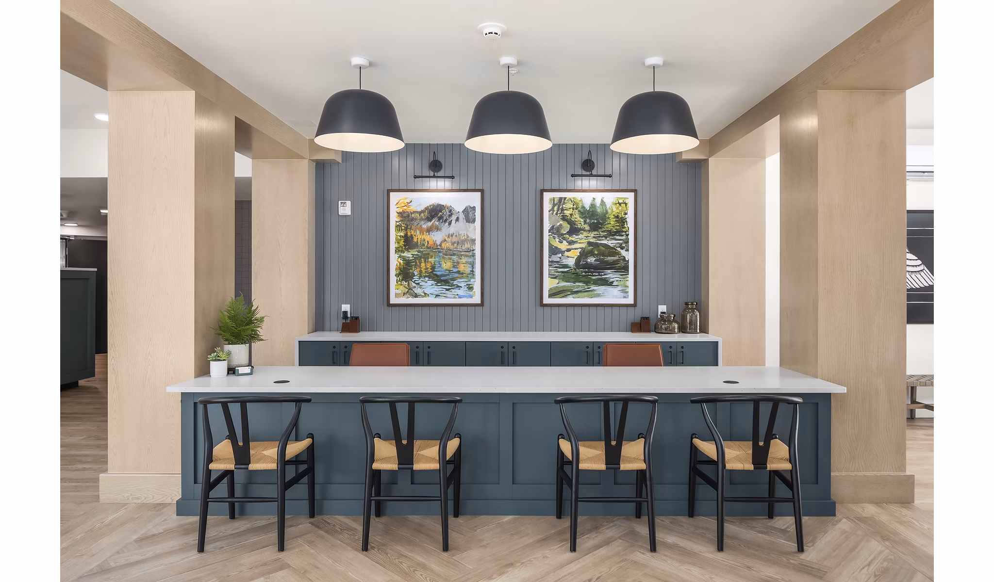 Clubhouse featuring modern design and cozy seating at Prose Kent Station Apartments