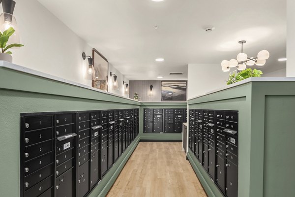 Mail room with individual lockers at Prose Kent Station Apartments for secure and convenient package delivery