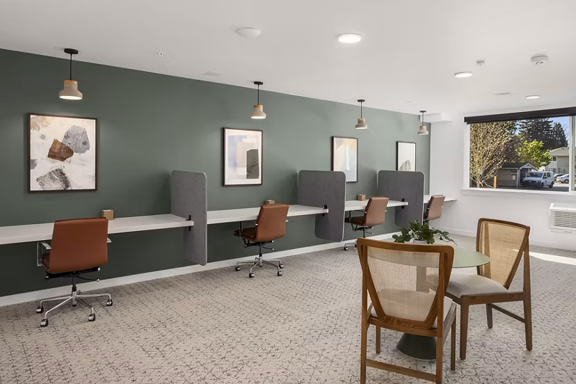 Modern business center with workstations at Prose Kent Station Apartments offering convenient facilities for residents