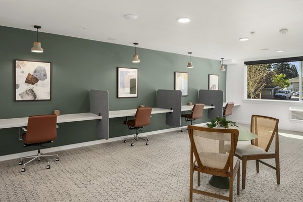 Modern business center with workstations at Prose Kent Station Apartments offering convenient facilities for residents