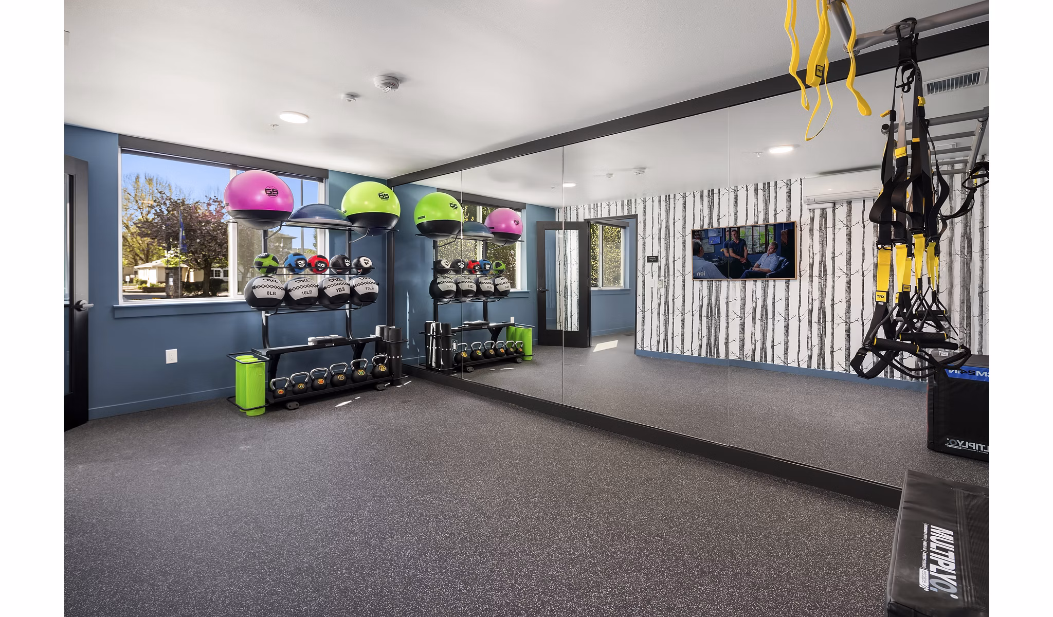 Modern fitness center with advanced equipment at Prose Kent Station Apartments