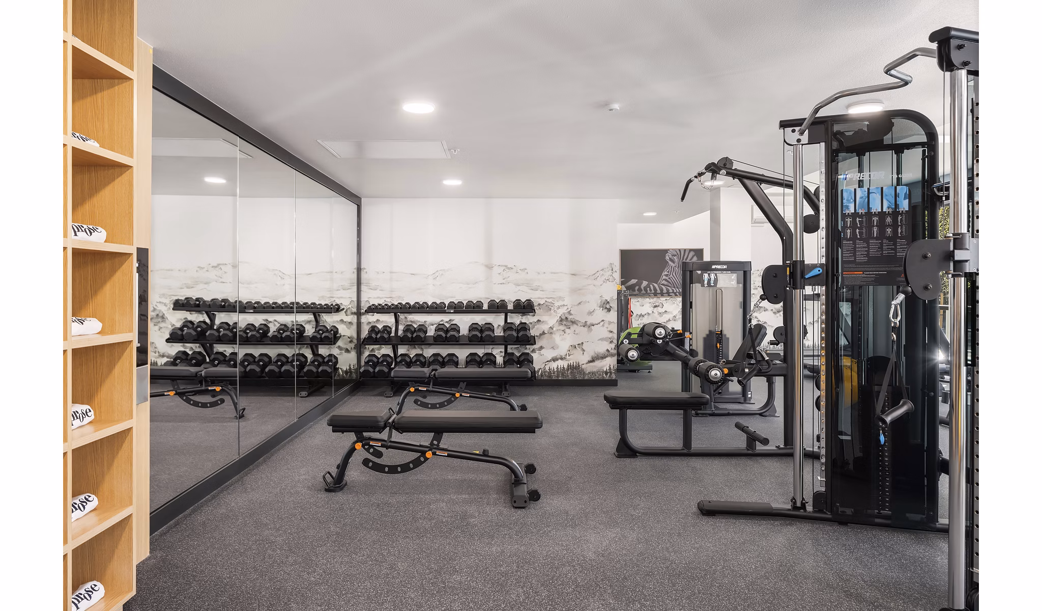 Fitness center with state-of-the-art equipment at Prose Kent Station Apartments, offering luxury amenities for active lifestyles