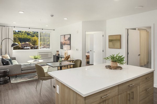 Spacious living area with modern furnishings in Prose Kent Station Apartments