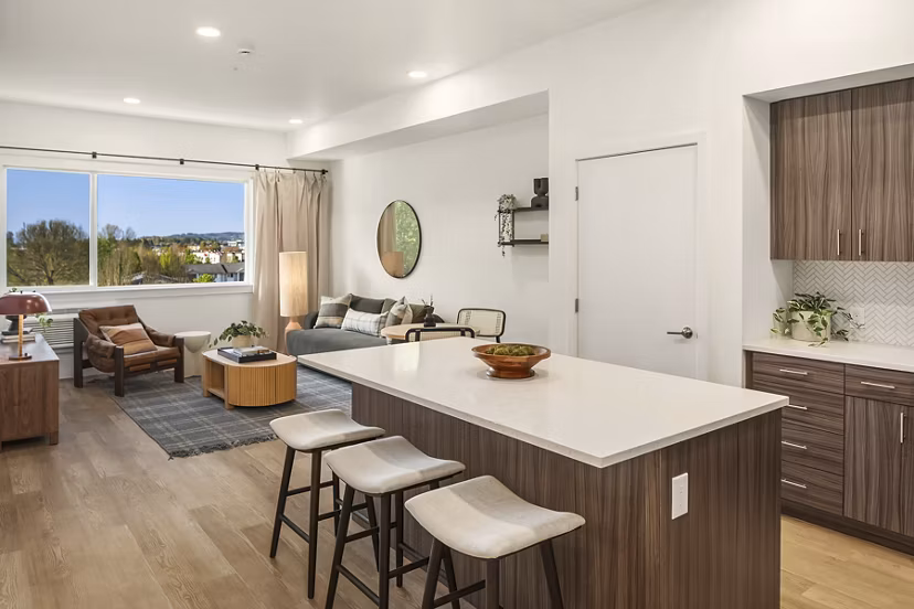 Modern kitchen with stainless steel appliances in Prose Kent Station Apartments