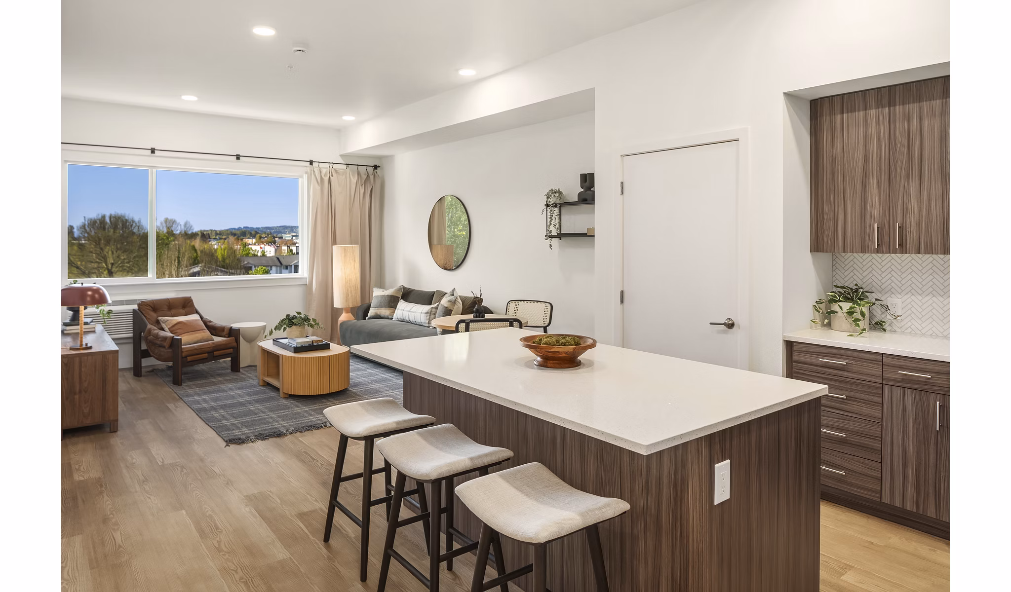 Modern kitchen with stainless steel appliances in Prose Kent Station Apartments