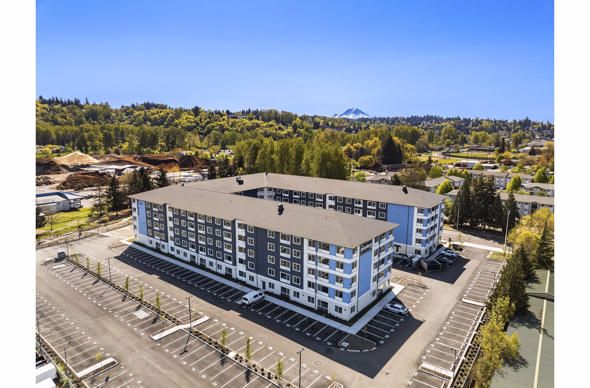 Prose Kent Station Apartments: Scenic view of modern luxury apartments with lush greenery in downtown