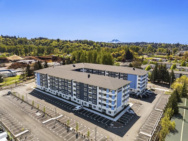 Prose Kent Station Apartments: Scenic view of modern luxury apartments with lush greenery in downtown