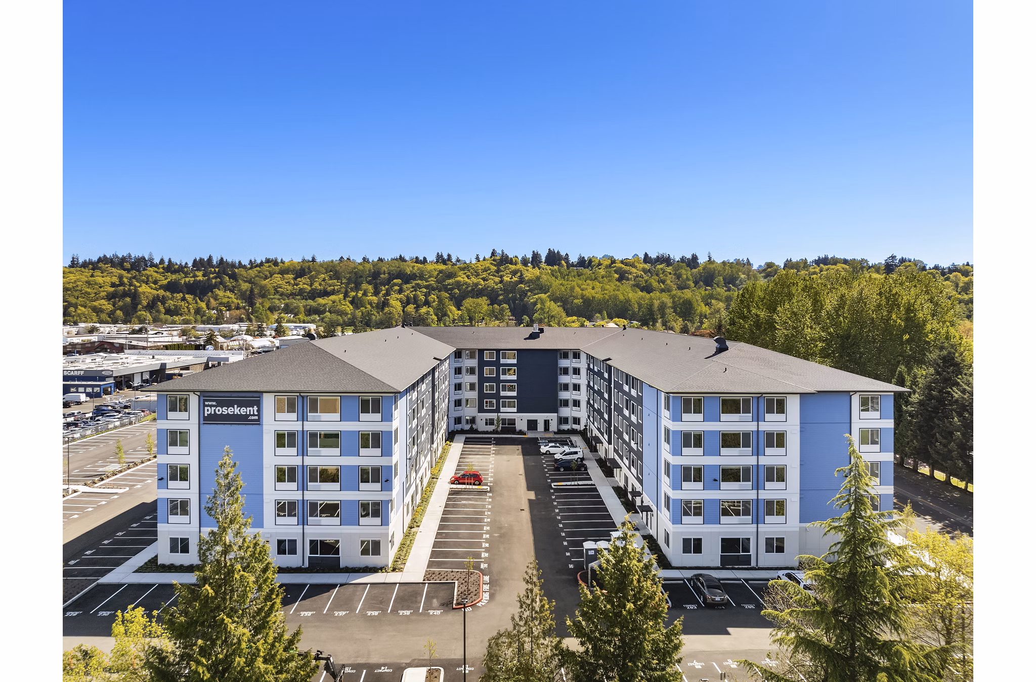 Prose Kent Station: Scenic view of luxury apartments with landscaped grounds and modern architecture in Greystar community