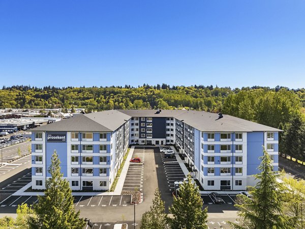 Prose Kent Station: Scenic view of luxury apartments with landscaped grounds and modern architecture in Greystar community