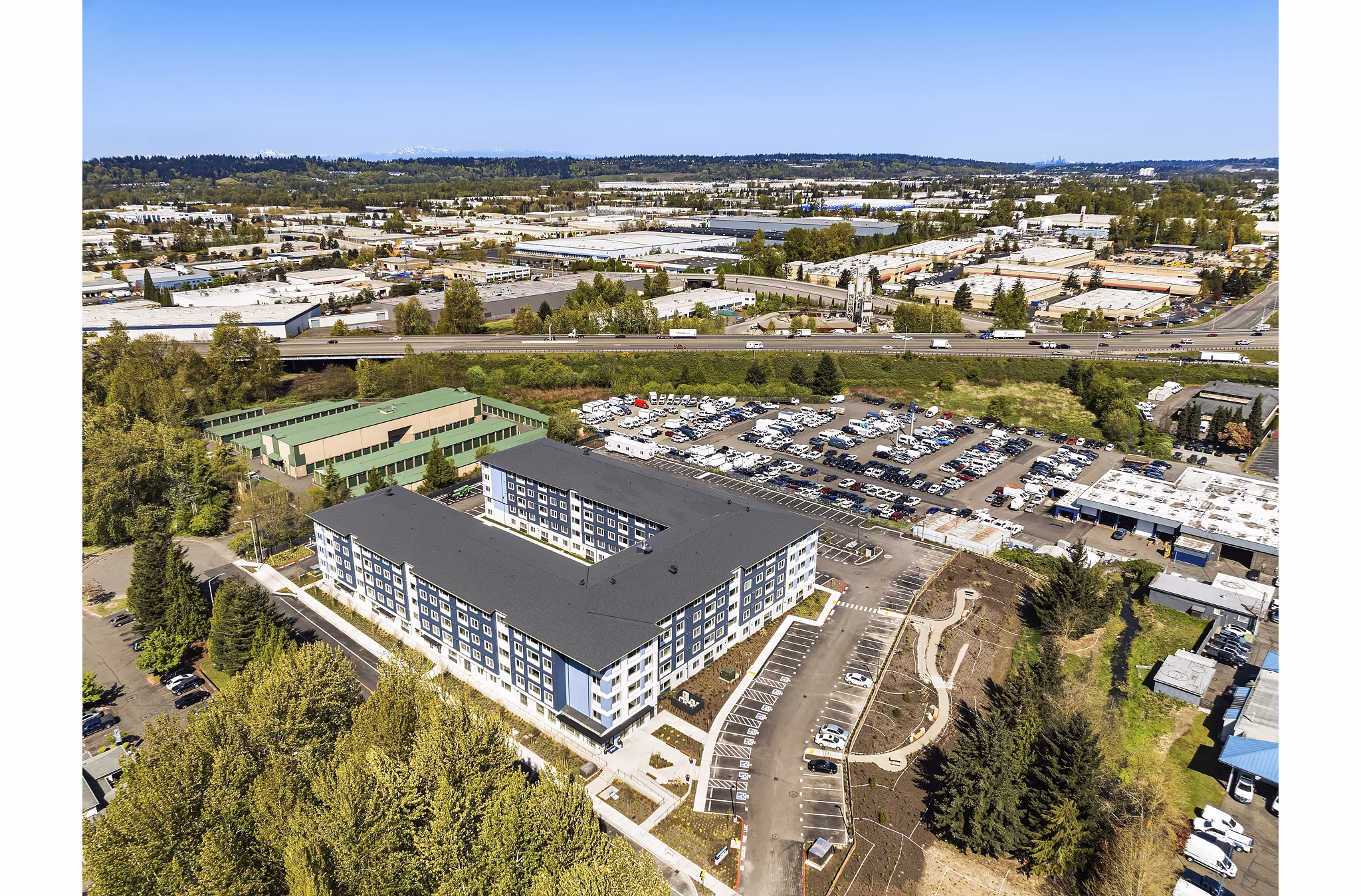 Prose Kent Station Apartments: View of modern luxury apartments featuring large windows