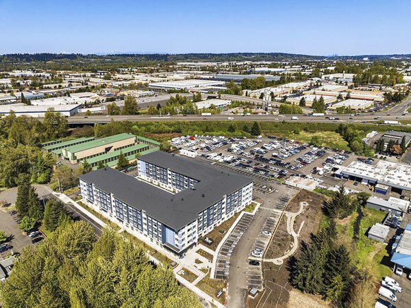 Prose Kent Station Apartments: View of modern luxury apartments featuring large windows