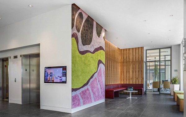 Clubhouse lobby with contemporary decor at Flats on D Apartments