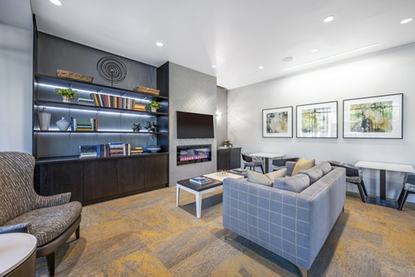 Clubhouse with modern seating and lighting at Flats on D Apartments