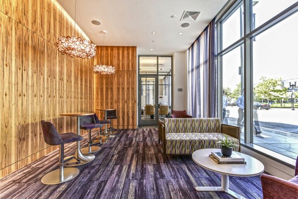 Modern clubhouse featuring sleek design and comfortable seating at Flats on D Apartments