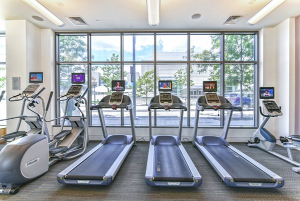 fitness center at Flats on D Apartments
