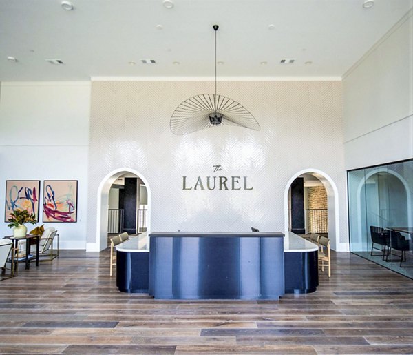 Clubhouse featuring contemporary design and vibrant community spaces at The Laurel Apartments