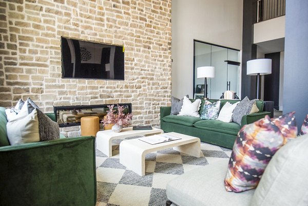 Luxurious clubhouse with modern seating and decor at The Laurel Apartments