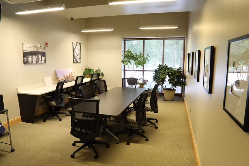 Meeting space equipped with modern facilities at Heinz Lofts Apartments, perfect for business gatherings and events