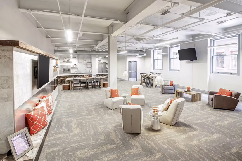 Heinz Lofts: Modern clubhouse with stylish seating and games area in Heinz Lofts Apartments, offering luxury living options in the city