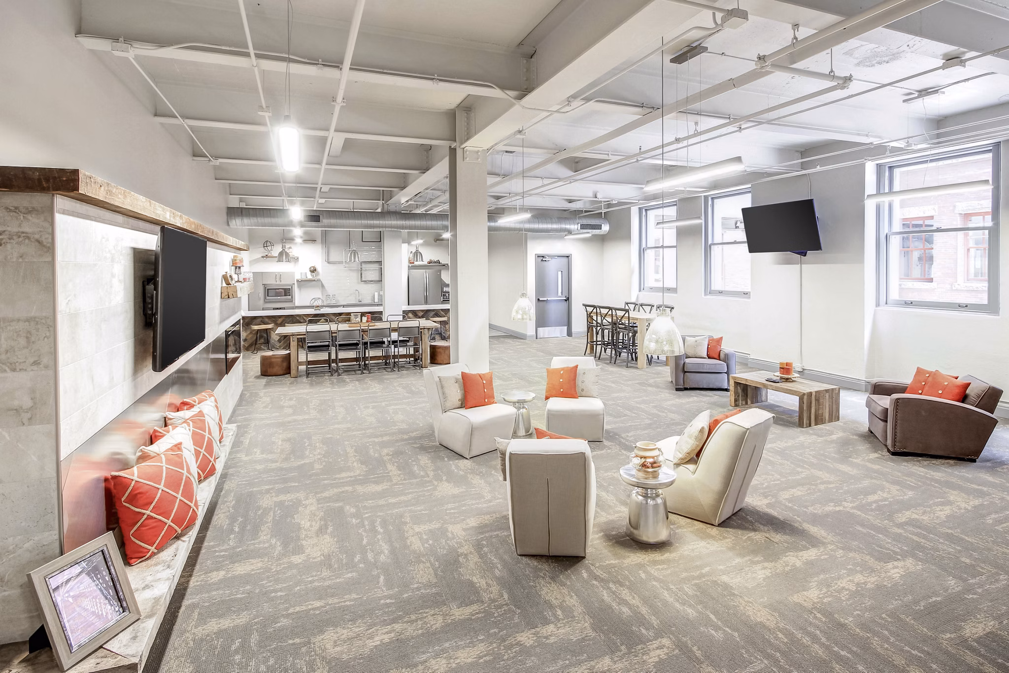 Heinz Lofts: Modern clubhouse with stylish seating and games area in Heinz Lofts Apartments, offering luxury living options in the city