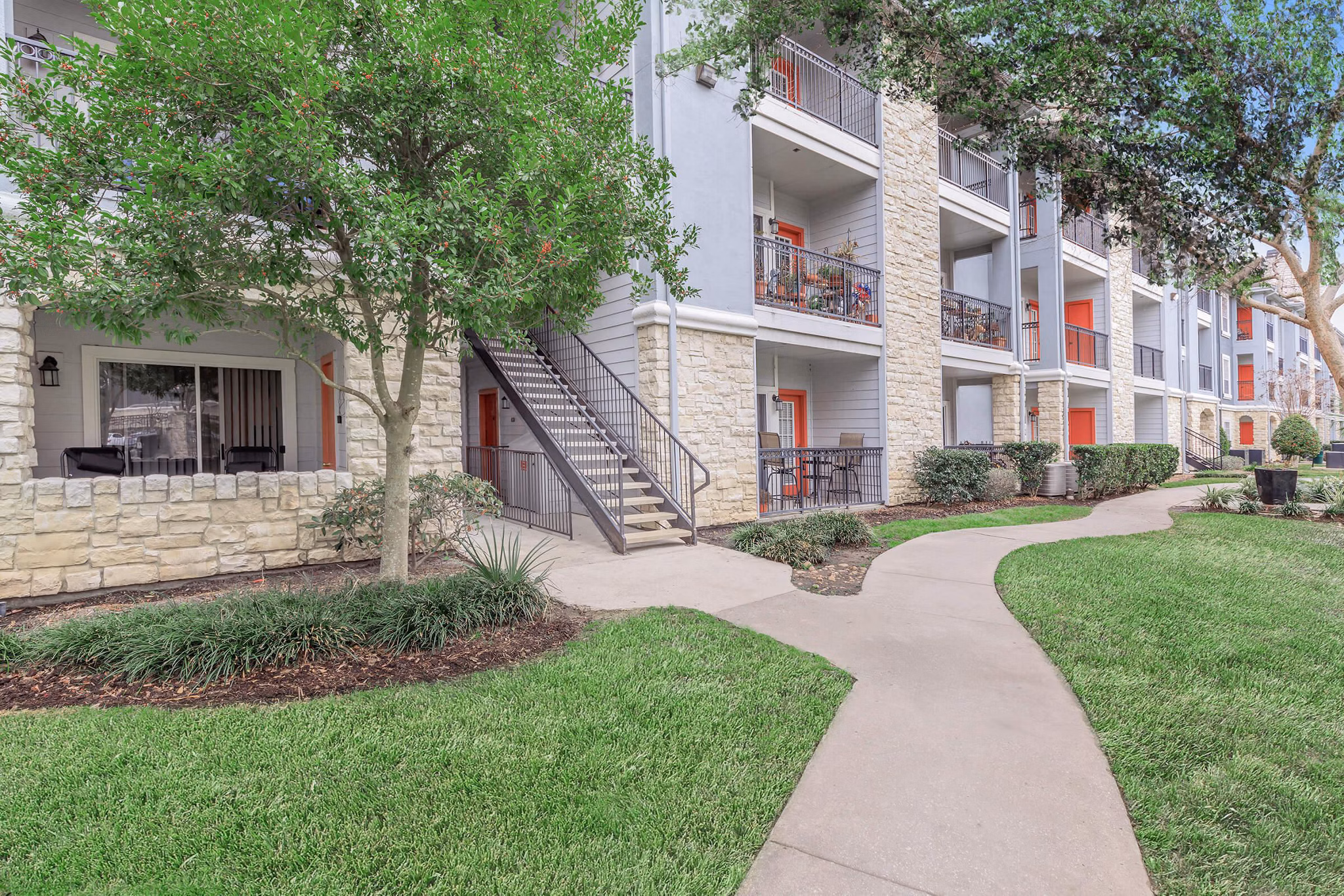 City Park: Luxury at The Heights apartments, featuring contemporary design and lush landscaping in a desirable neighborhood location