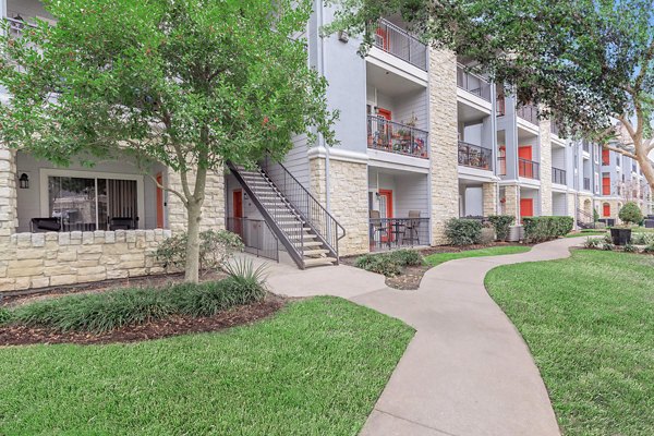 City Park: Luxury at The Heights apartments, featuring contemporary design and lush landscaping in a desirable neighborhood location