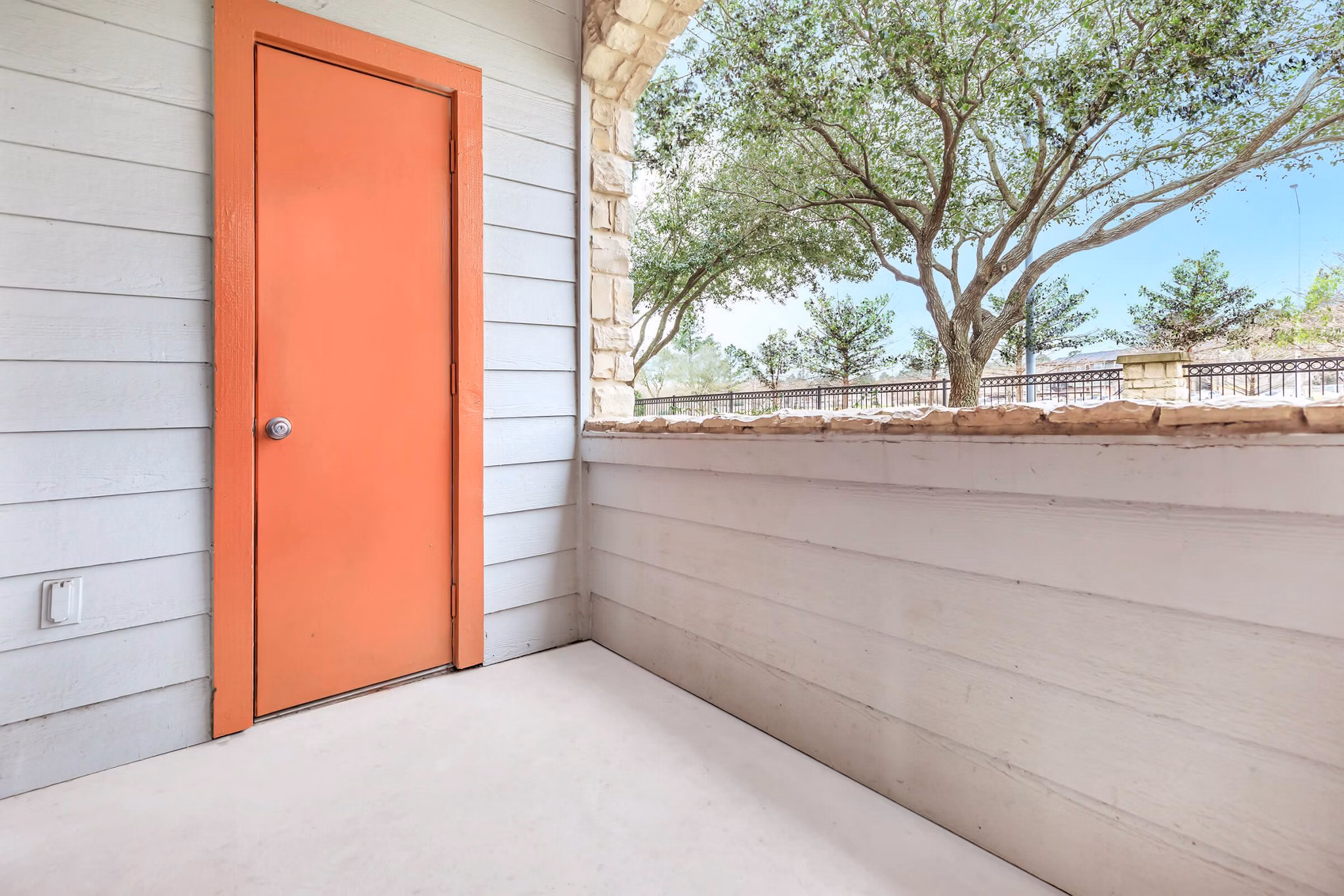 Outdoor patio with modern seating at City Park in The Heights Apartments, perfect for leisure and socializing