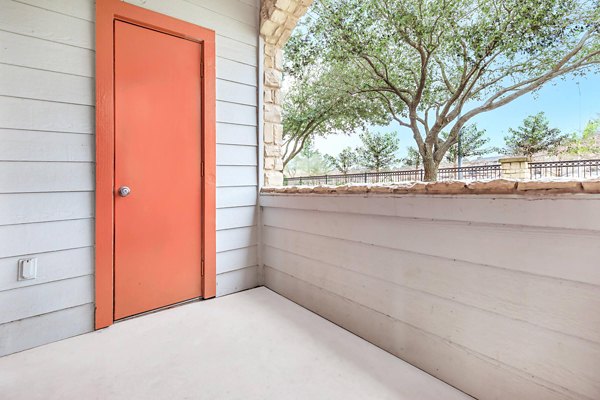 Outdoor patio with modern seating at City Park in The Heights Apartments, perfect for leisure and socializing