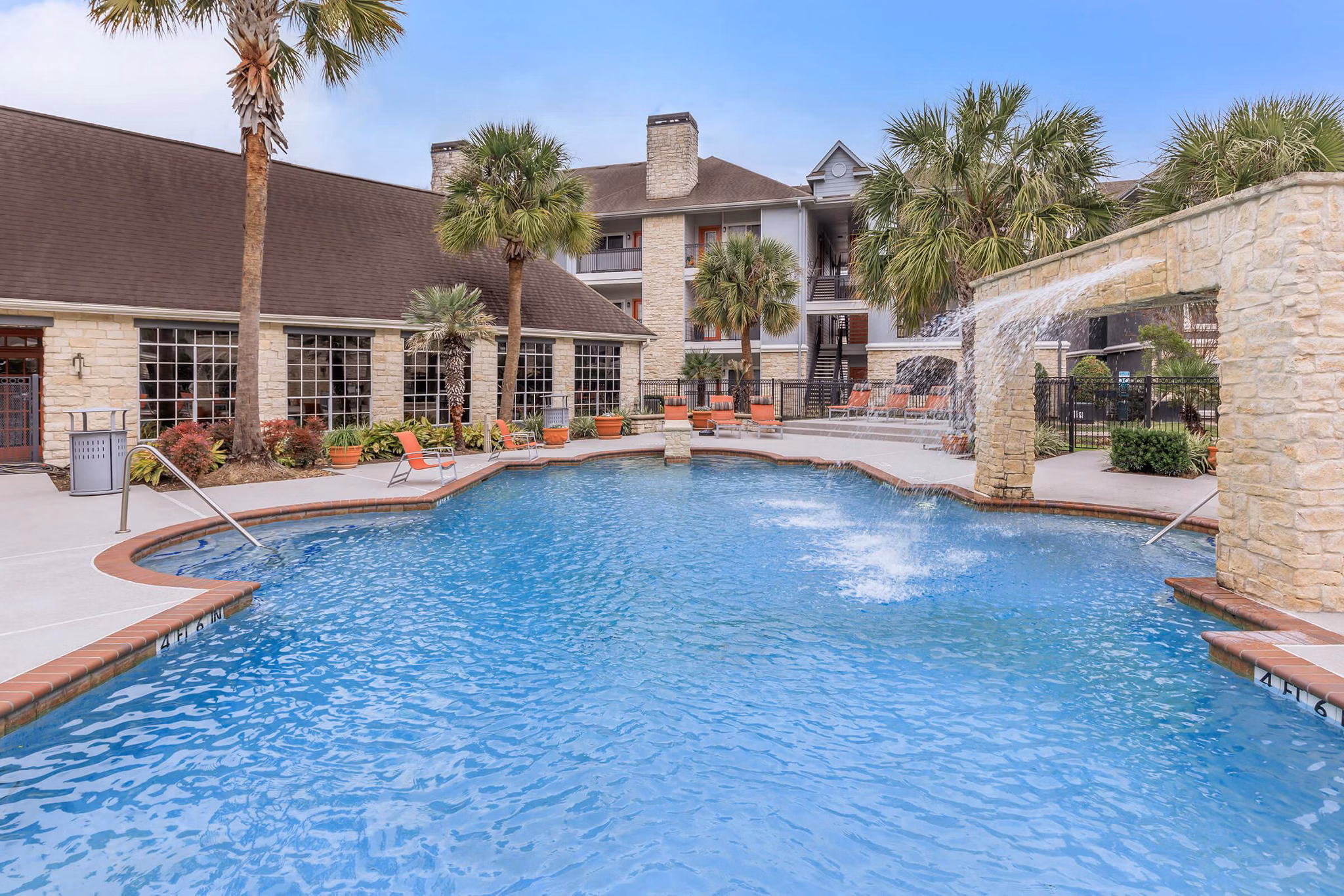 Rooftop pool with city views at The Heights Apartments at City Park
