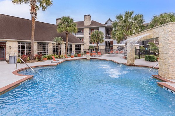 Rooftop pool with city views at The Heights Apartments at City Park