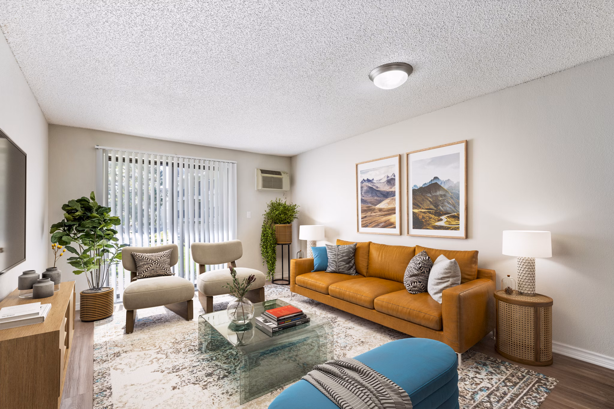 Spacious living room with modern decor and ample natural light at Belmar Villas Apartments