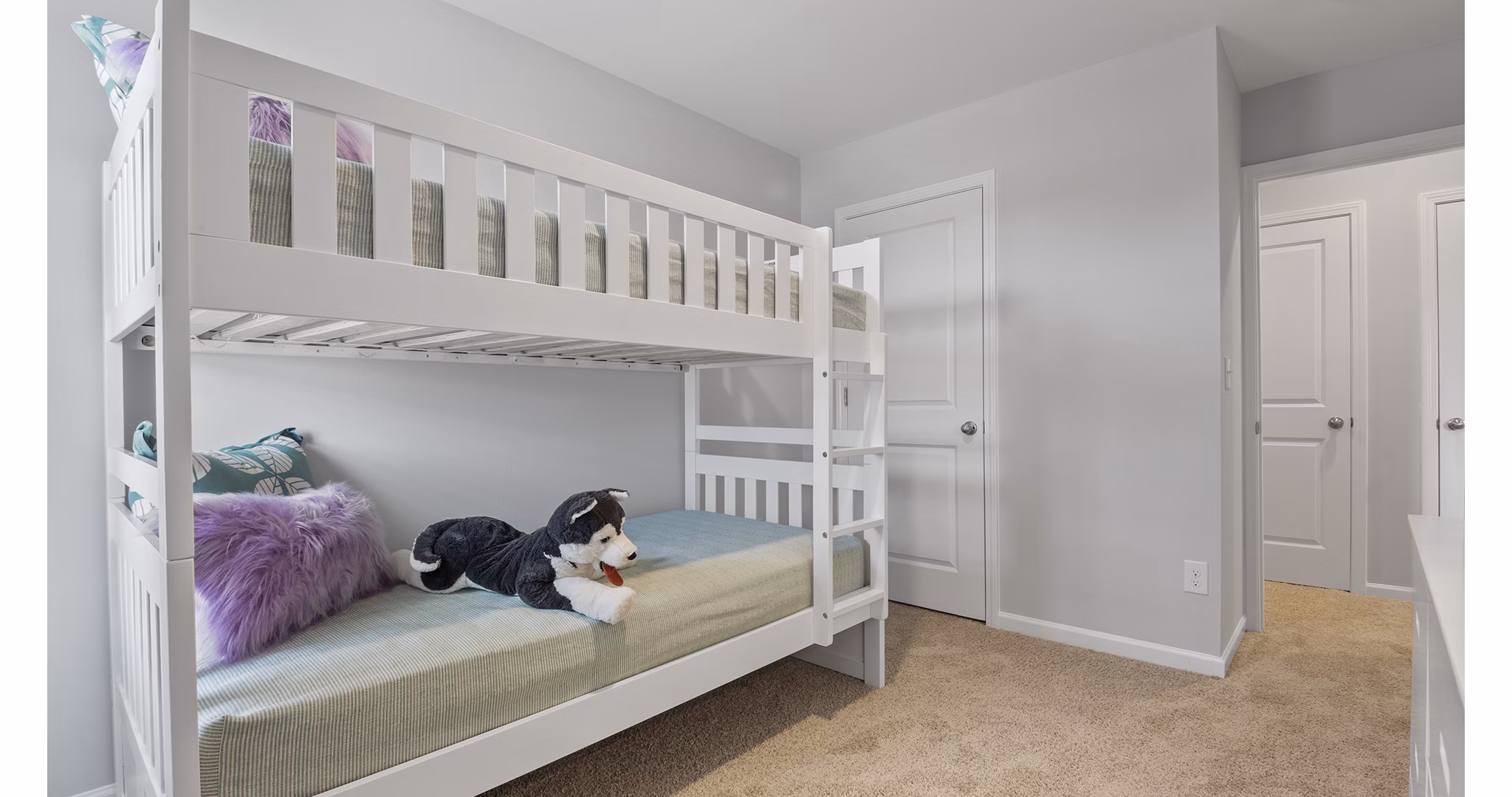 Luxurious bedroom featuring modern decor at Rosemary Glen Apartments