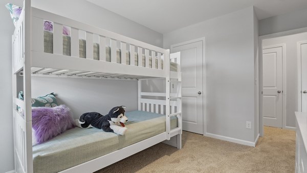Luxurious bedroom featuring modern decor at Rosemary Glen Apartments