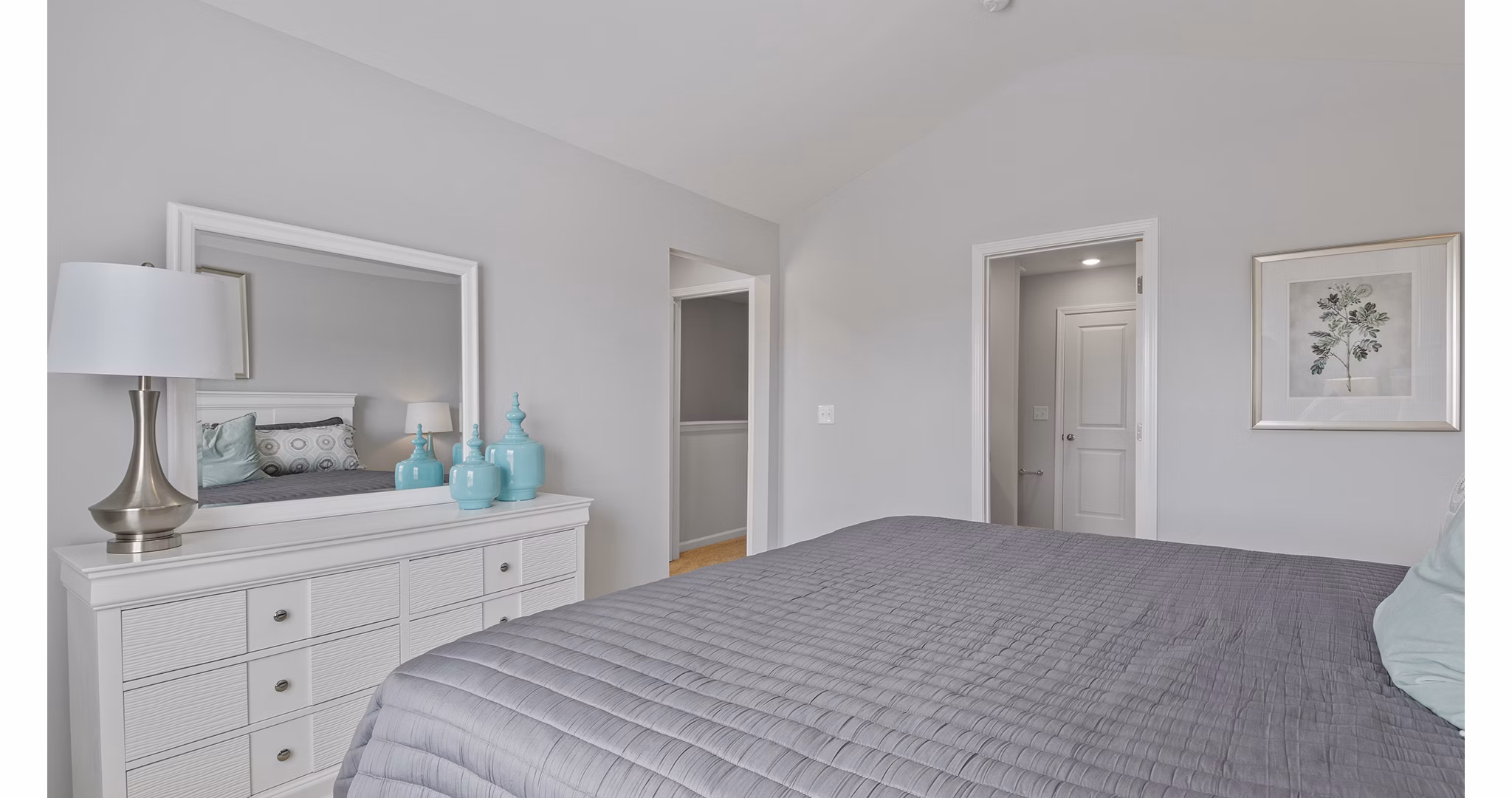 Cozy bedroom with modern design at Rosemary Glen Apartments