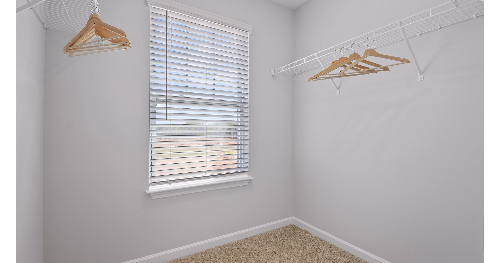 Walk-in closet with ample storage at Rosemary Glen Apartments