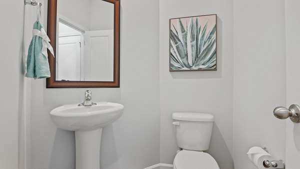 Modern bathroom with sleek fixtures at Rosemary Glen Apartments