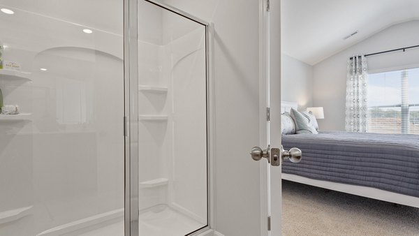 Bathroom featuring sleek fixtures and neutral tones at Rosemary Glen Apartments