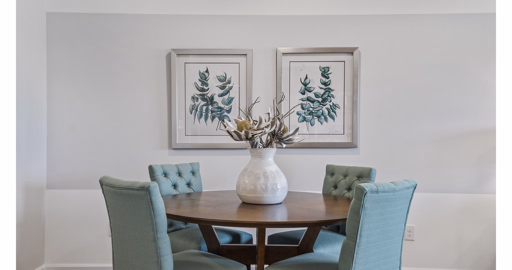 Elegant dining area with stylish decor at Rosemary Glen Apartments, offering luxurious living in a Greystar-managed community