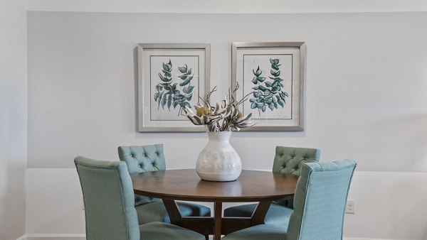 Elegant dining area with stylish decor at Rosemary Glen Apartments, offering luxurious living in a Greystar-managed community