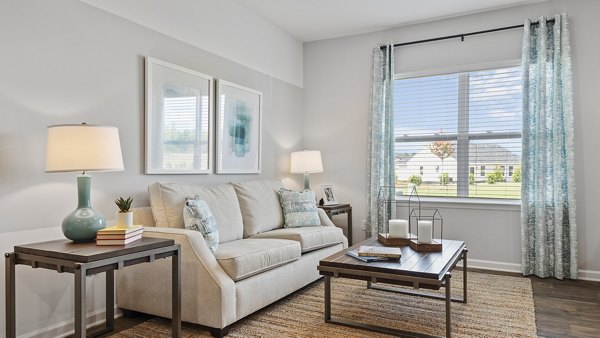 Spacious living room with modern decor at Rosemary Glen luxury apartments