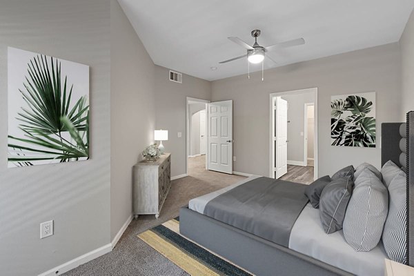 Cozy bedroom with modern decor in Cyan at Green Valley Apartments
