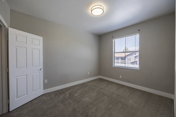 Cozy bedroom with elegant decor at Cyan at Green Valley Apartments