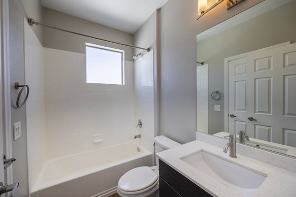 Modern bathroom with sleek fixtures at Cyan at Green Valley Apartments